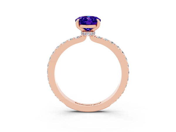 Rose gold Oval Cut Tanzanite Solitaire Engagement Ring with Pavé Band and Four-Prong Setting