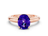 Rose gold Oval Cut Tanzanite Solitaire Engagement Ring with Round Band and Four-Prong Setting