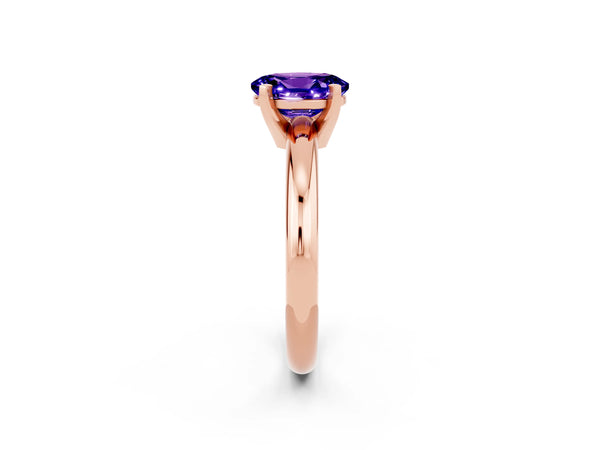 Rose gold Oval Cut Tanzanite Solitaire Engagement Ring with Round Band and Four-Prong Setting