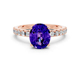 Rose gold Oval Cut Tanzanite Solitaire Pavé Band with Four-Prong Setting