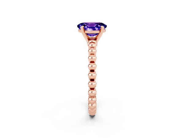 Rose gold Oval Cut Tanzanite Solitaire Ring with Beaded Band and Prong Setting