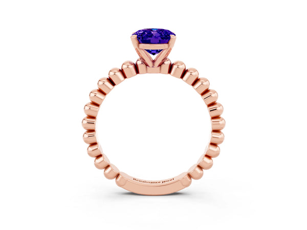 Rose gold Oval Cut Tanzanite Solitaire Ring with Beaded Band and Prong Setting