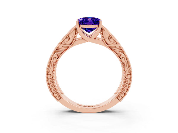 Rose gold Oval Cut Tanzanite Solitaire Ring with Engraved Band and Four-Prong Setting