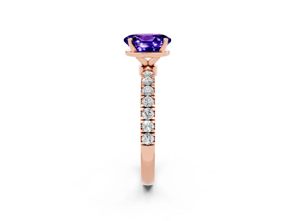 Rose gold Oval Cut Tanzanite Solitaire Ring with Pavé Accents and Four-Prong Setting