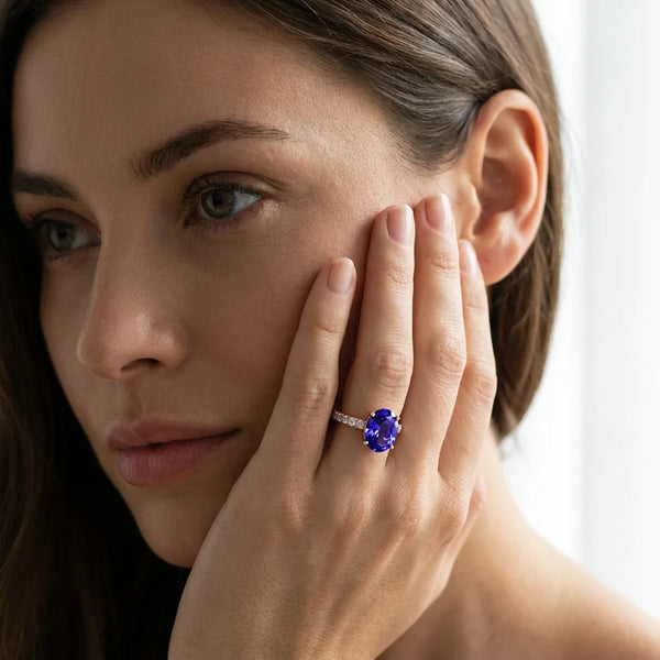 Rose gold Oval Cut Tanzanite Solitaire Ring with Round  Pavé Band and Four-Prong Setting