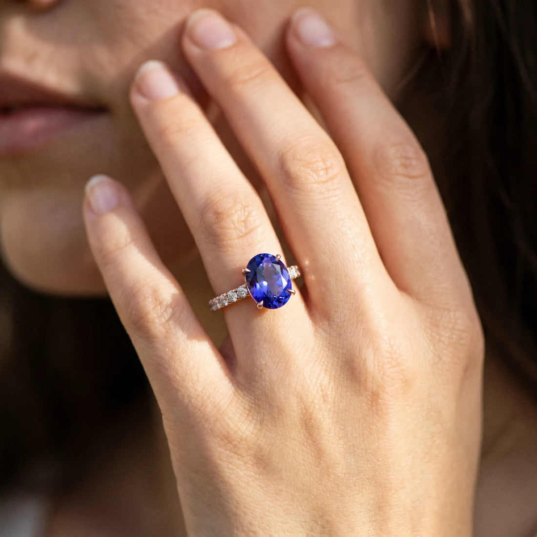 Rose gold Oval Cut Tanzanite Solitaire Ring with Round  Pavé Band and Four-Prong Setting_44