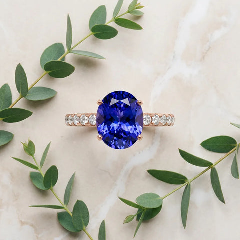Rose gold Oval Cut Tanzanite Solitaire Ring with Round  Pavé Band and Four-Prong Setting_45