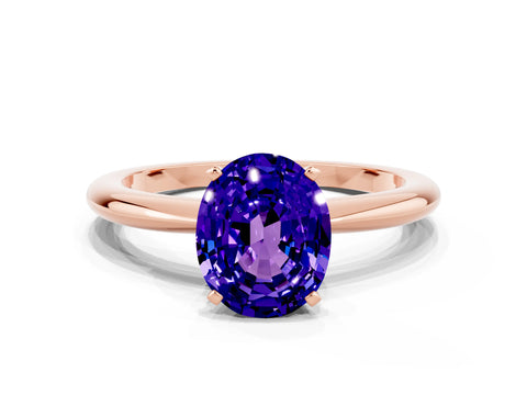 Rose gold Oval Cut Tanzanite Solitaire Ring with Six-Prong Setting and Classic Band