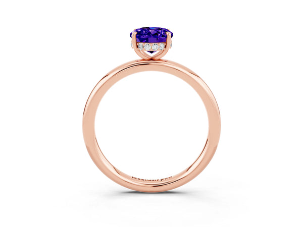 Rose gold Oval Cut Tanzanite Solitaire Ring with Thin Band and Four-Prong Setting