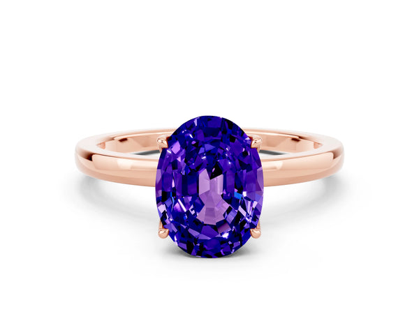 Rose gold Oval Cut Tanzanite Solitaire Ring with Thin Band and Prong Setting