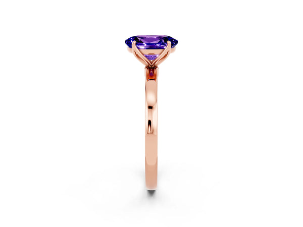 Rose gold Oval Cut Tanzanite Solitaire Ring with Thin Band and Prong Setting