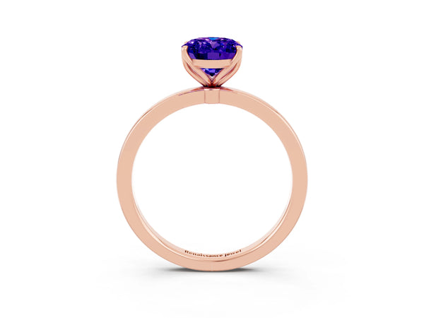 Rose gold Oval Cut Tanzanite Solitaire Ring with Thin Band and Prong Setting