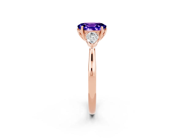 Rose gold Oval Cut Tanzanite Three-Stone Ring with Pear  Side Stones and Prong Setting