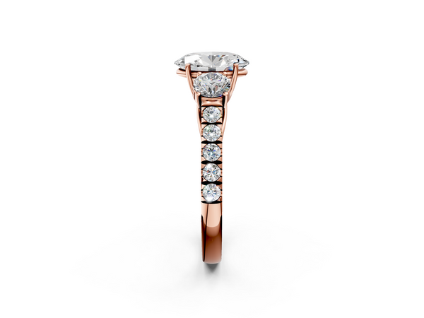 Rose gold Oval Cut Diamond Three-Stone Ring with Round Side Stones and Pavé Band