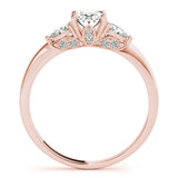 Rose gold Oval Cut Three-Stone Diamond Ring with Pear Side Stones on a Classic Solitaire Band with Prong Setting 2