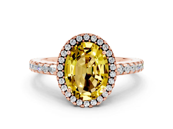 Rose gold Oval Cut Yellow Sapphire Halo Engagement Ring with Pavé Band and Prong Setting