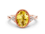 Rose gold Oval Cut Yellow Sapphire Halo Ring with Tapered Band and Four-Prong Setting