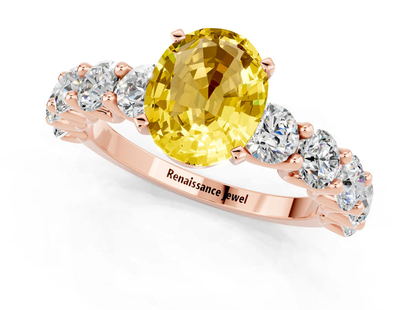 Rose gold Oval Cut Yellow Sapphire Prong Setting with Side Stones on a Pave Band