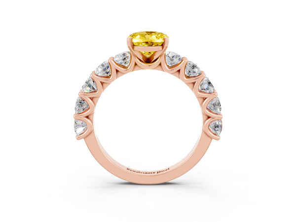 Rose gold Oval Cut Yellow Sapphire Prong Setting with Side Stones on a Pave Band