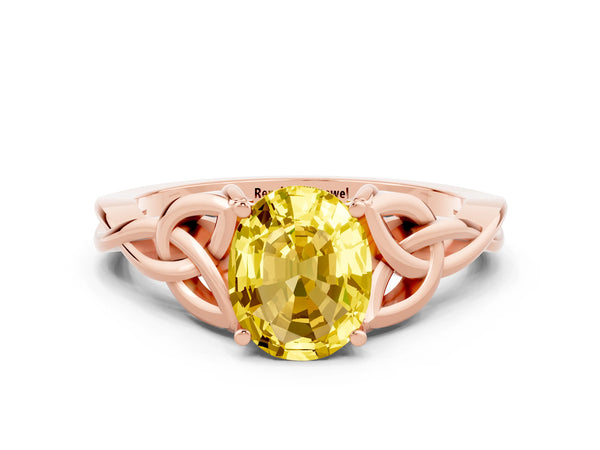 Rose gold Oval Cut Yellow Sapphire Solitaire Celtic Knot Ring with Four-Prong Setting