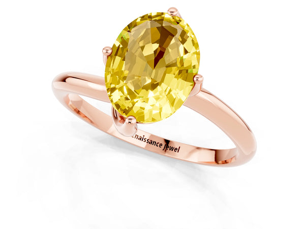 Rose gold Oval Cut Yellow Sapphire Solitaire Engagement Ring with Four-Prong Setting and Classic Band