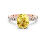 Rose gold Oval Cut Yellow Sapphire Solitaire Ring with Round  Pavé Band and Four-Prong Setting_44