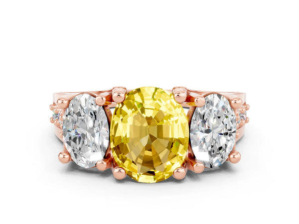 Rose gold Oval Cut Yellow Sapphire Three-Stone Ring with Channel Set Band and Four-Prong Setting