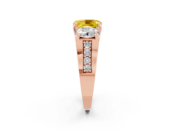 Rose gold Oval Cut Yellow Sapphire Three-Stone Ring with Channel Set Band and Four-Prong Setting