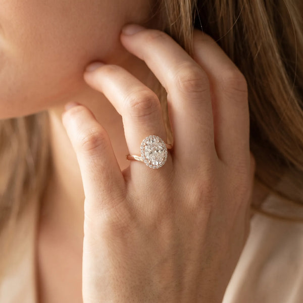 Rose gold Oval Diamond Bezel Halo Ring with Plain Band