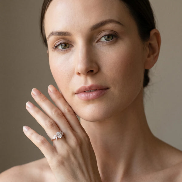Rose gold Oval Diamond Floral Cluster Ring with Marquise Side Stones and Six-Prong Solitaire Setting