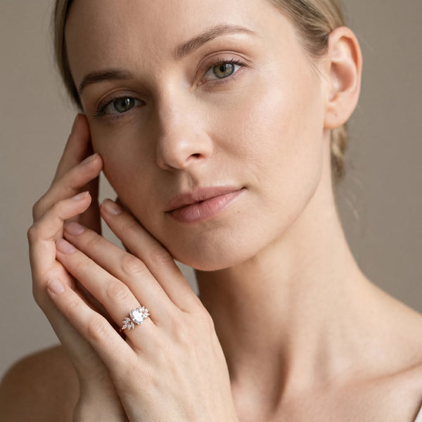 Rose gold Oval Diamond Floral Side Stone Solitaire with Marquise Accents and Four-Prong Setting