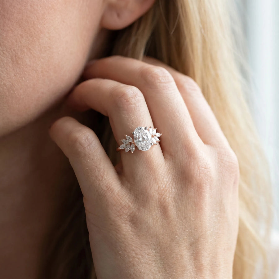 Rose gold Oval Diamond Floral Side Stone Solitaire with Marquise Accents and Four-Prong Setting