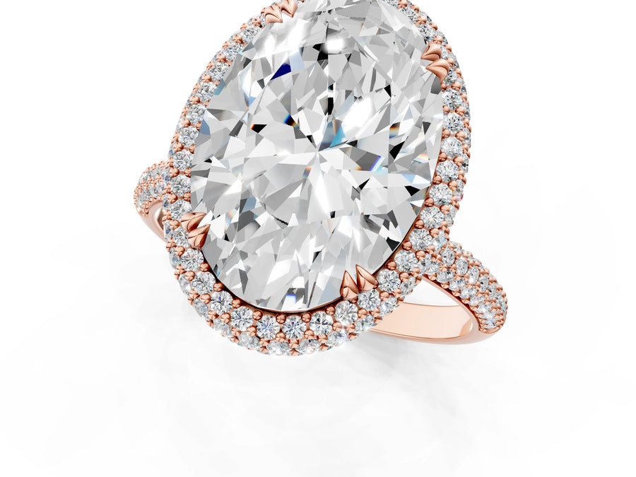 Rose gold Oval Diamond Halo Ring with Round Diamond Accents