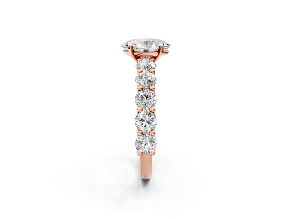Rose gold Oval Cut Diamond Prong Setting with Side Stones on a Pave Band