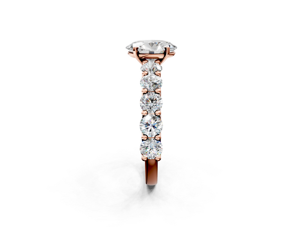 Rose gold Oval Cut Diamond Prong Setting with Side Stones on a Pave Band