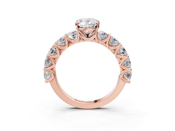Rose gold Oval Cut Diamond Prong Setting with Side Stones on a Pave Band