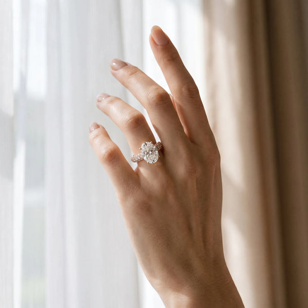 Rose gold Oval Diamond Solitaire Ring with Prong Setting and Pavé Band