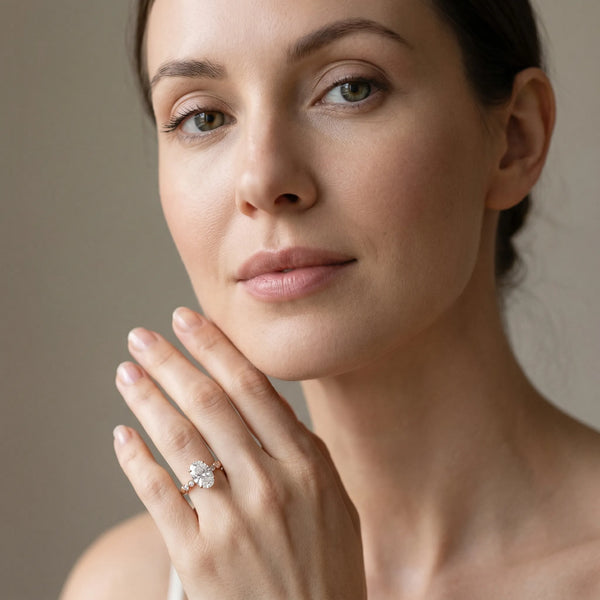 Rose gold Oval Solitaire Bezel Accent Diamond Engagement Ring with Beaded Band and Four-Prong Setting