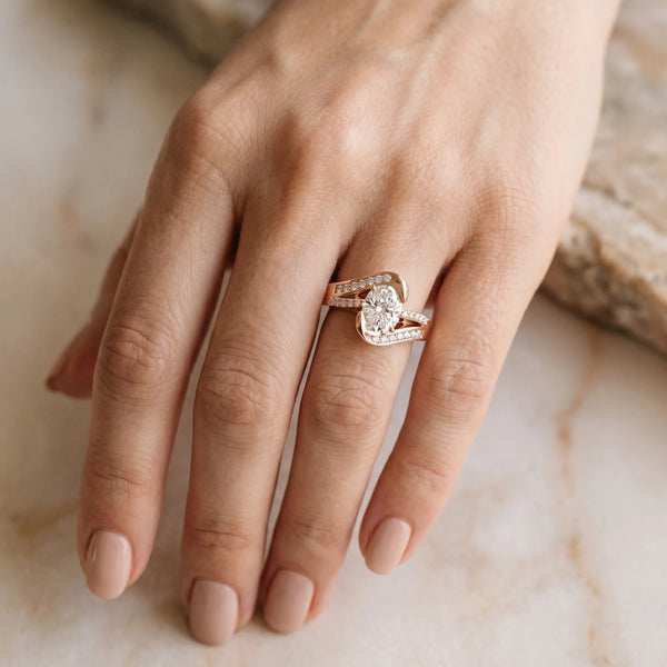 Rose gold Oval Solitaire Bypass Diamond Engagement Ring with Channel-Set Band and Four-Prong Setting