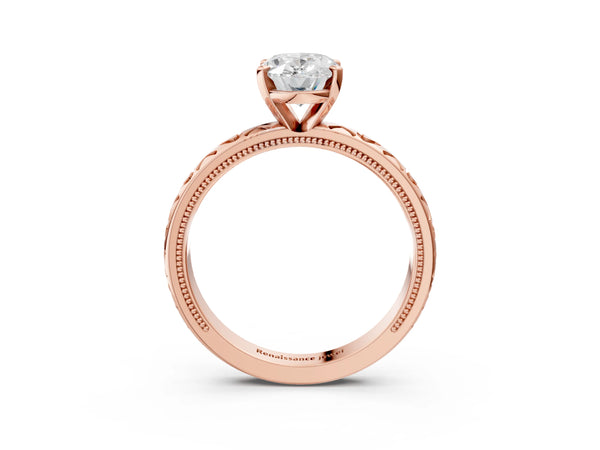 Rose gold Oval Solitaire Diamond Engagement Ring with XO Engraved Band and Four-Prong Setting