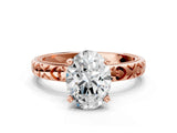 Rose gold Oval Solitaire Diamond Engagement Ring with XO Engraved Band and Four-Prong Setting