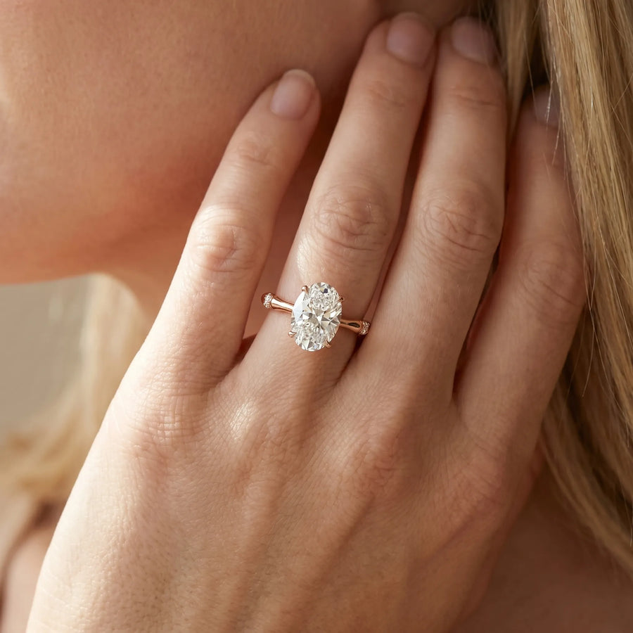 Rose gold Oval Solitaire Diamond Ring with Bamboo Band and Four-Prong Setting