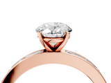 Rose gold Oval Solitaire Diamond Ring with Channel-Set Baguette Band and Four-Prong Setting_97