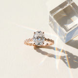 Rose gold Oval Solitaire Diamond Ring with Infinity Twist Band and Four-Prong Setting_16