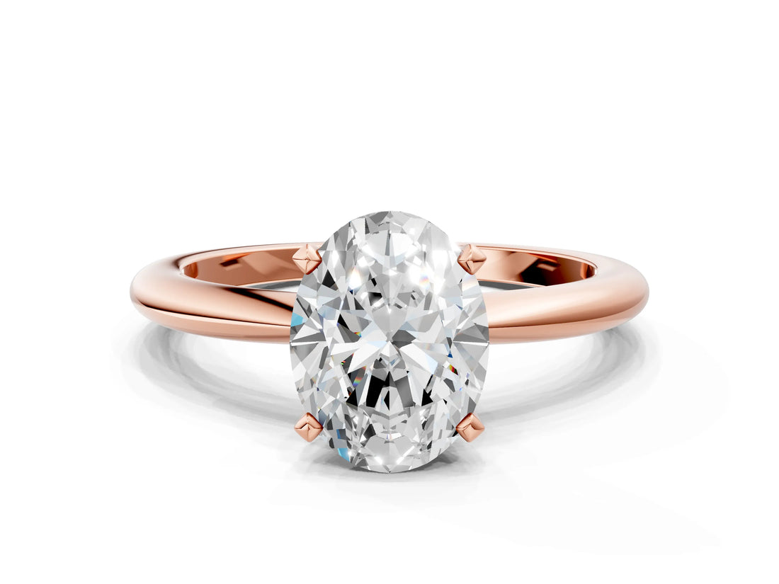 Rose gold Oval Solitaire Diamond Ring with Six-Prong Setting on a Classic Band