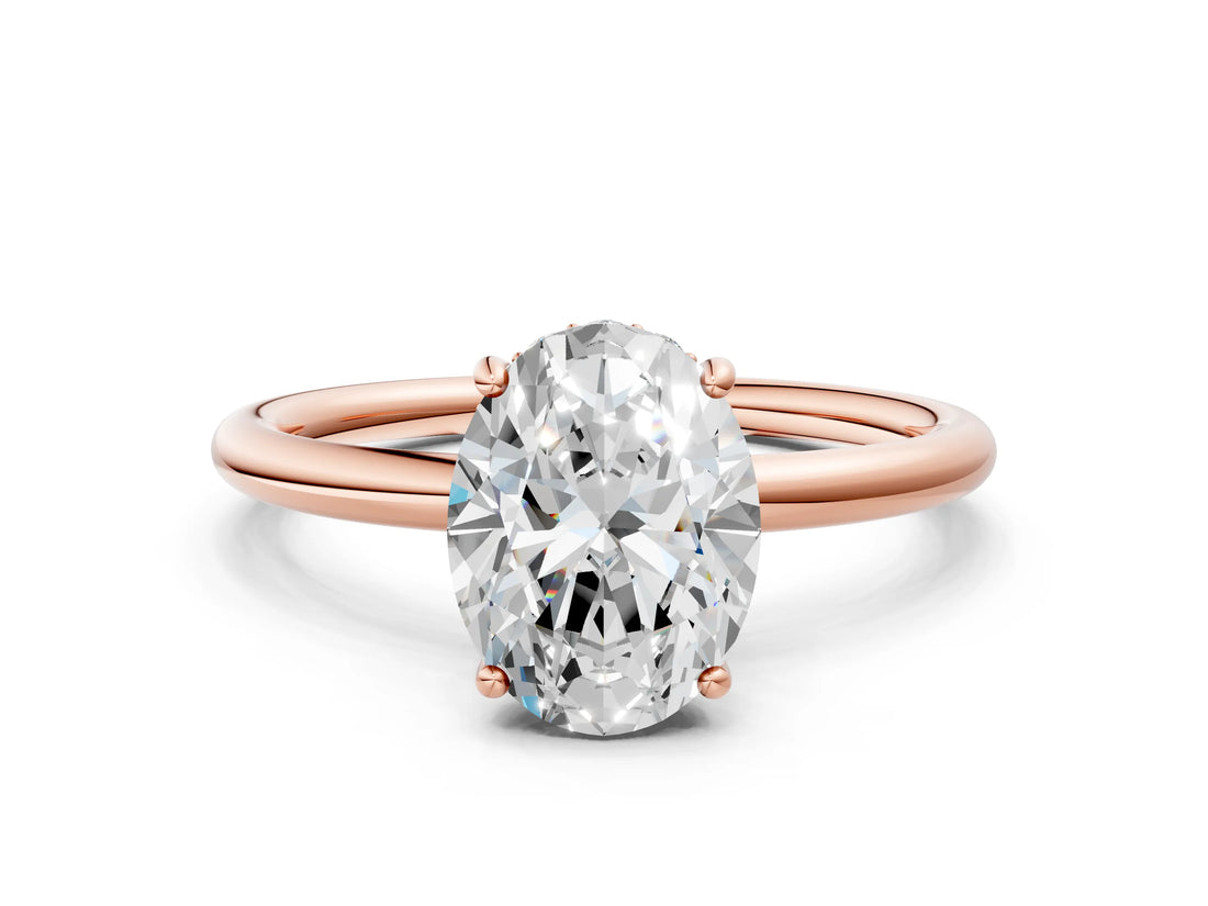 Rose gold Oval Solitaire Diamond Ring with a Classic Band and Four-Prong Setting