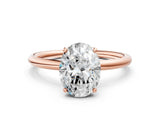 Rose gold Oval Solitaire Diamond Ring with a Classic Band and Four-Prong Setting