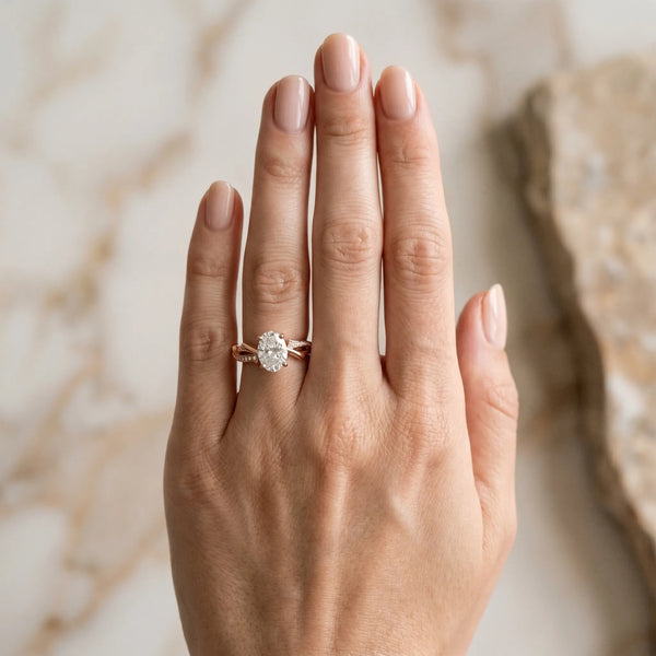Rose gold Oval Solitaire Diamond Twist Band with Four-Prong Setting