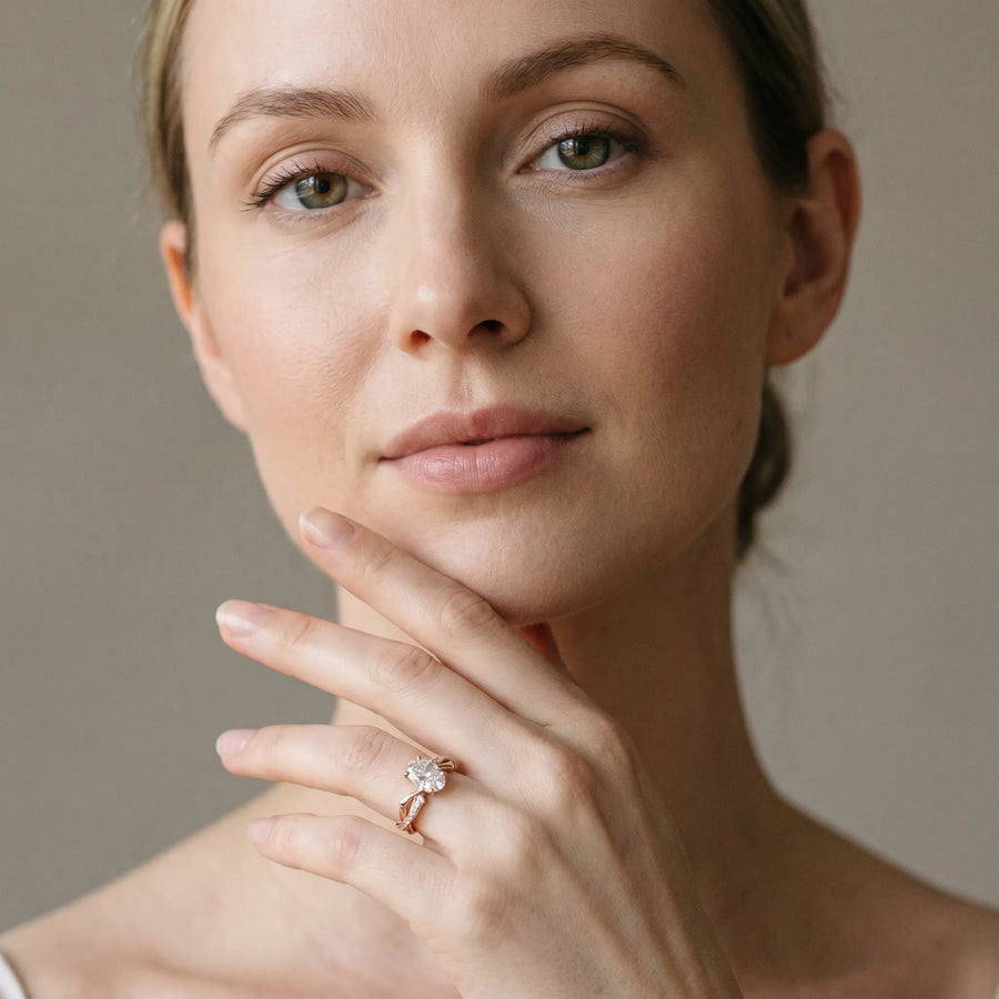 Rose gold Oval Solitaire Diamond Twist Band with Four-Prong Setting
