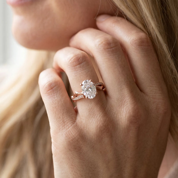 Rose gold Oval Solitaire Diamond Twist Band with Four-Prong Setting